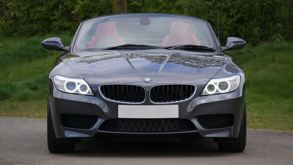 Black BMW Z4 convertible, a two-seater suited to a ROM or solemnisation in Singapore